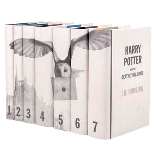 This Harry Potter book jacket design is designed for anyone and everyone with a connection to Hogwarts. A postal owl departing the castle pairs with modern design elements for a set that will be instantly recognizable to fans, yet unlike anything they’ve seen before.