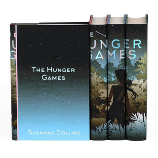 Cover treatment of the book set featuring a night sky. The Hunger Games limited edition collectible book set featuring custom dust jackets from Juniper Books.
