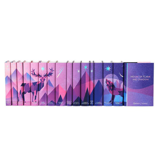 Book covers feature iridescent foil stars and book titles, illustrations of a stag, mountains, and a wolf on a pink purple gradient background. Front of book cover features book title and author in iridescent foil set against a starry sky.