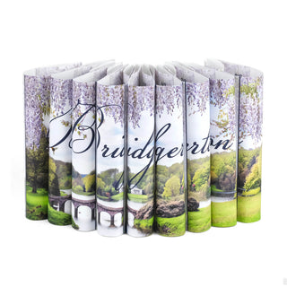The Juniper Books jacket design across the spines was developed with historical romance readers in mind. Beautiful landscape imagery spans the covers, readers can peek through the wisteria to view a Regency garden scene. On each book is a symbol unique to the stories and characters within, superfans will discover layers of meaning in the designs. 