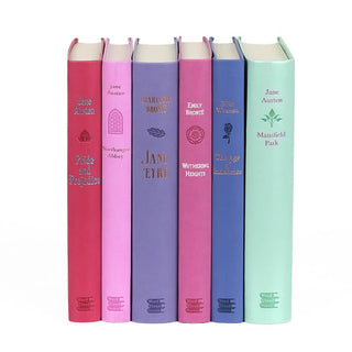 Unjacketed faux leather books from Word Cloud. Books come in pastel pink, purple, and green.