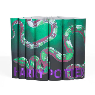 Green Slytherin Harry Potter dust jackets with a green serpent across the spines and title in purple foil from Juniper Books