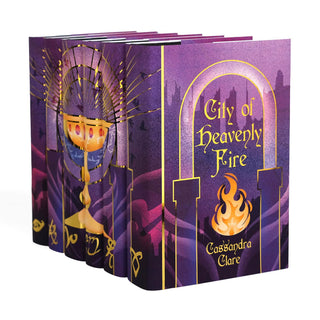 Angled view displaying spine and cover design of the Limited Edition Mortal Instruments Books Set by Cassandra Clare wrapped in Juniper Books collectible book covers.