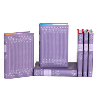 Custom collectible purple dust jackets with ornamental spines designs and book titles. Covers feature an intricate ornamental design in light purple on a darker purple background.