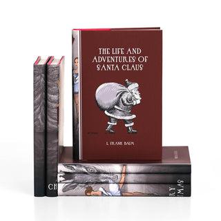 This festive set of novels is the perfect way to celebrate your favorite year-end traditions. Book Set, gift, trade, Christmas shopping. Covers feature black and white illustrations of Santa Clause