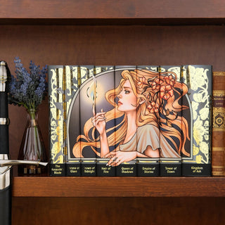 Limited Edition for Throne of Glass book set by Sarah J. Maas styled on a bookshelf with covers by Juniper Books.