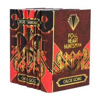 Angled view displaying spine and cover design for the Shanghai Secrets Book Set by Chloe Gong, wrapped in Juniper Books collectible book covers.