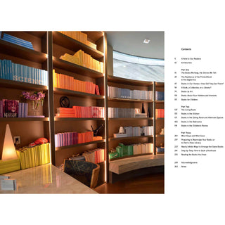 A library that Juniper Books helped to design for a client. The library houses books of all different colors, but are sorted by them and placed with purpose on each shelf.