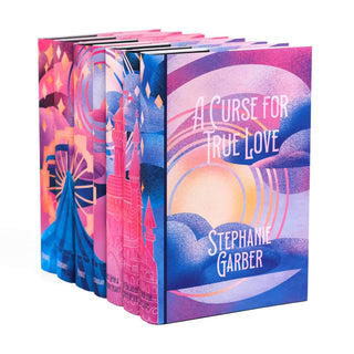 A seven-book hardcover collection of the Stephanie Garber book jackets, displayed at an angle to showcase the front and spine designs. The spines of the book jackets create a complete illustration of a carousel, a circus tent, a castle, and pale yellow stars set against a pink, purple, and blue gradient sunset. The cover of the seventh book reads, 'A Curse for True Love', and the author’s name is in white against pink, purple, and blue sunset and puffy clouds.