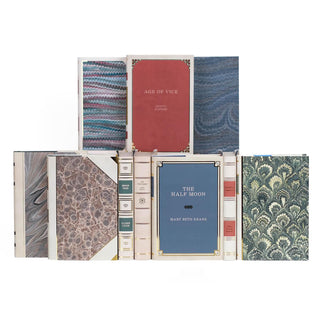 Ten contemporary fiction books featuring custom collectible gold foil dust jackets with colorful marbled covers from Juniper Books.