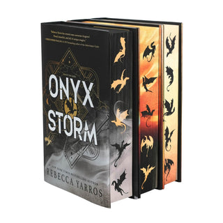 Book titled 'Onyx Storm', 'Iron Flame', 'Fourth Wing'by Rebecca Yarros with decorative sprayed edges, dragon design.
