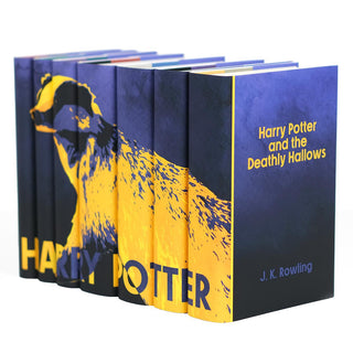 Yellow Badger Hufflepuff custom collectible dust jackets on Harry Potter book set with  from Juniper Books