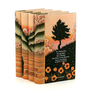 Angled view displaying spine and cover design of John Steinbeck Artist Series Book Set wrapped in Juniper Books collectible book covers.