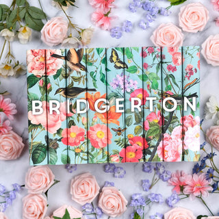 Bridgerton by Julia Quinn styled on an eye catching marble background with special edition covers from Juniper Books.