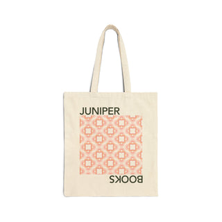 Juniper Books Tote Bag in neutral canvas. Front of bag features Juniper Books Logomark pattern and company name in black.