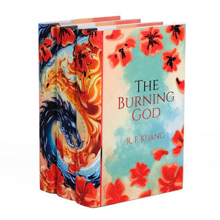 A set of three books from The Poppy War trilogy, displayed at an angle to showcase the cover and spine design. The cover of The Burning God is visible, featuring a serene blue and cream background adorned with vibrant red poppies with foil accents. The spines align to reveal a dynamic artwork of a blue dragon surrounded by a fiery phoenix and red poppies, creating a cohesive and striking visual.