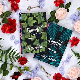 Special Edition book covers for Lauren Roberts Powerless Novellas Extension book set styled on a bookshelf with covers by Juniper Books.