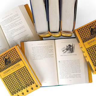 Print size of Harry Potter Hufflepuff book set with custom collectible yellow and black dust jackets from Juniper Books.