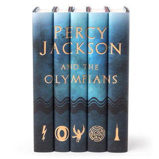 Blue watercolor style book covers featuring gold symbols on each spine and Percy Jackson and the Olympians typed across spine in gold serif font.