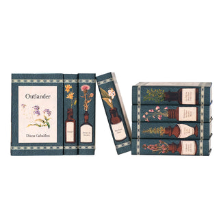 Perfect for the Outlander fan who already owns the 9 hardcover editions of the series published by Delcorte Press, this set makes a fantastic gift or a great set to show off in your Zoom background or when friends visit. With unique design touches on each book jacket design, this set of book jackets to precisely fit your book set is a showstopper for any room. 