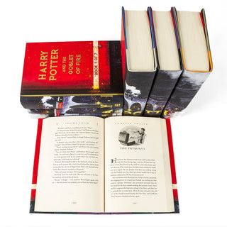 For this set, our designers reimagined the iconic image of the scarlet steam engine speeding through the Scottish countryside with gold metallic detailing (a Juniper Books first!) across the spines.