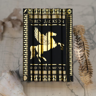 Rick Riordan's Percy Jackson Book Series Custom Designed Foil Jackets ONLY by Juniper Books. Makes a stunning gift or a beautiful set on your shelf. Trade. Gift. Custom. 