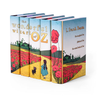 Our complete Wizard of Oz book set comes with book jackets (and books) featuring a beautiful design that pays tribute to early illustrated editions of these classics. A perfect gift for literary lovers or middle readers. Juniper Books' specialty custom book set.