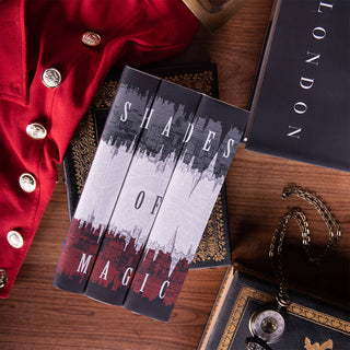 V.E. Schwab Shades of Magic Juniper Books Jackets Only set, shown here on books.
