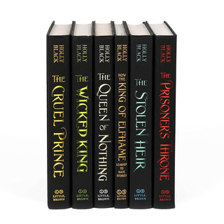 Unjacketed spines of The Folk of the Air Book Set. Spines feature book title, author name, and publisher in various foil colors.