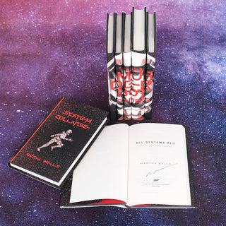 Interior signed title page detail from The Murderbot Diaries by Martha Wells, part of a limited edition set from Juniper Books.