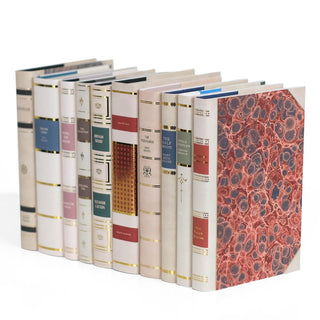 Side view of ten contemporary fiction books featuring custom collectible gold foil dust jackets with colorful marbled covers from Juniper Books.