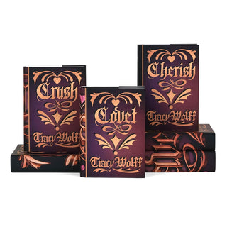 Dust jacket front covers feature book title and author name in gothic bronze font surrounded by ornamental flourishes set against a pink to black gradient background.