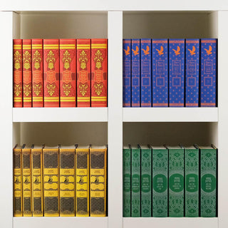 Harry Potter House Sets with collectible custom dust jackets. Red Gryffindor, Blue Ravenclaw, Yellow Hufflepuff, Green Slytherin Book Sets from Juniper Books.