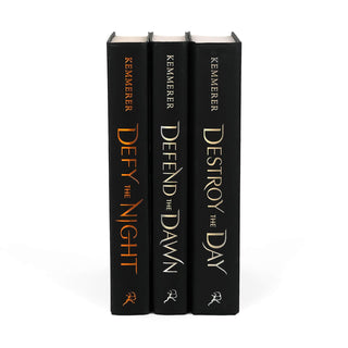 Unjacketed Defy the Night series by Brigid Kemmerer showing original spines beneath Juniper Books book covers.