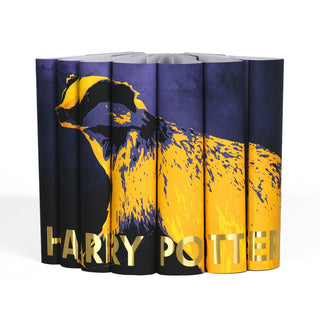 Yellow Hufflepuff Harry Potter dust jackets with a yellow badger across the spines and title in gold foil from Juniper Books