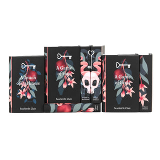 Hades x Persephone book set by Juniper Books, seven dust jackets displaying front covers showing pomegranate, serpent, and lily art.