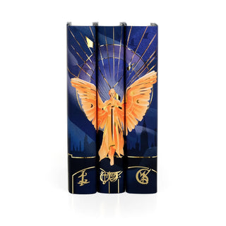 Three Juniper Books spines forming one image of an angel with outstretched wings over the Victorian London skyline, from the Infernal Devices Limited Edition book set
