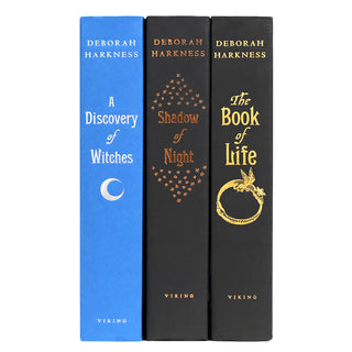 Deborah Harkness Trilogy shown here with no jackets. Spruce up your shelf with Juniper Books' custom specialty dust jackets!